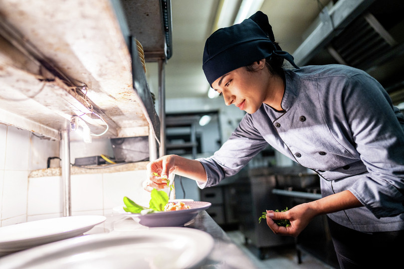Chef working in a kitchen.