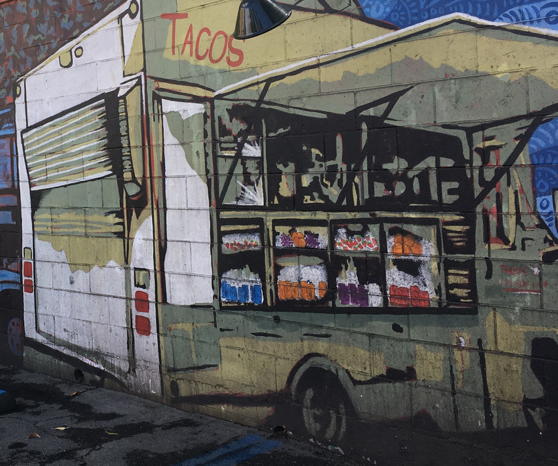 A mural of a food truck selling tacos. It is located in the parking lot of the Echo Park location of the Mexican restaurant Guisados in Los Angeles.