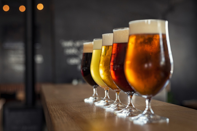 Glasses containing different sorts of craft beer.