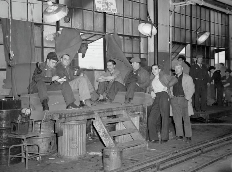 Workers at the first “sit-down” strike at the General Motors Fisher Body plant in Flint, Michigan, January 1937. (The strike began in 1936.) Photographer: Sheldon Dick; Library of Congress.